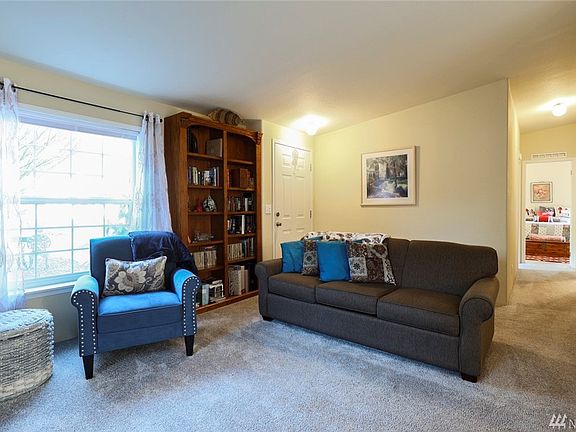 Looking down the hallway is the master and spare bedroom with second bathroom on the right.
