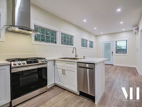 Plenty of windows, hardwood throughout, & fully air-conditioned!