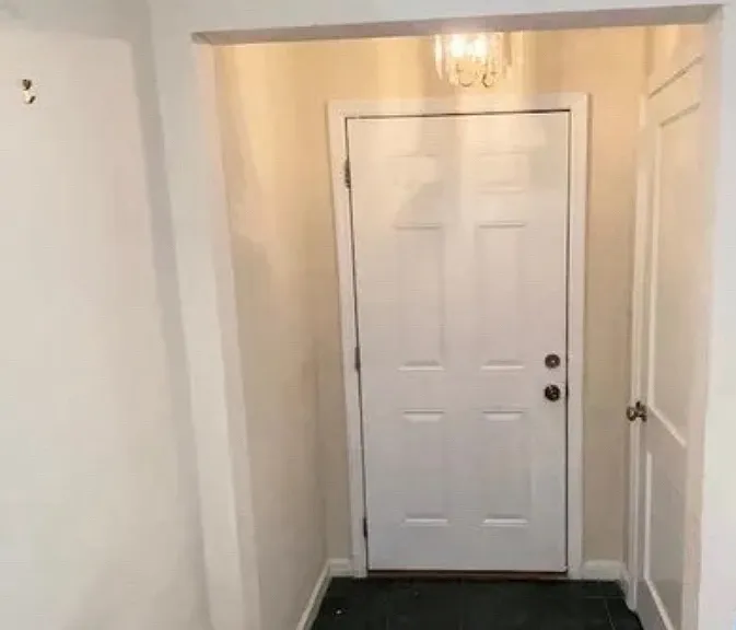 ENTRY TO HOME W/CLOSET