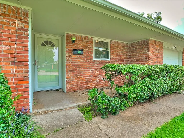 FRONT PORCH WITH STORM DOOR TOO
