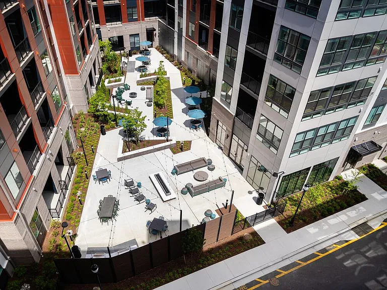 Courtyard #3 with fire pits, BBQ grills, and lounge areas