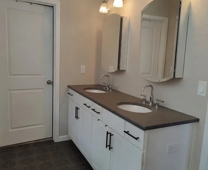 Primary bathroom, double vanity with dual medicine cabinet mirrors