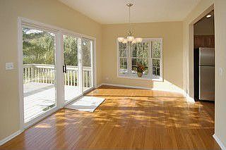 Dining room accesses deck and patio area