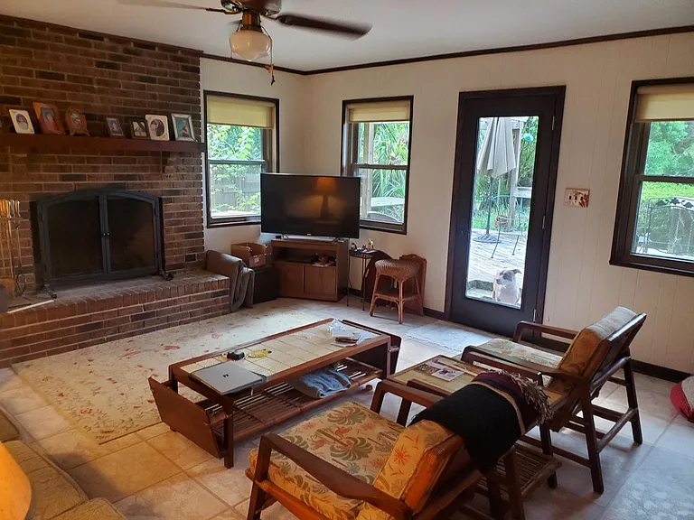 Family Room with door to Back Yard and Deck.