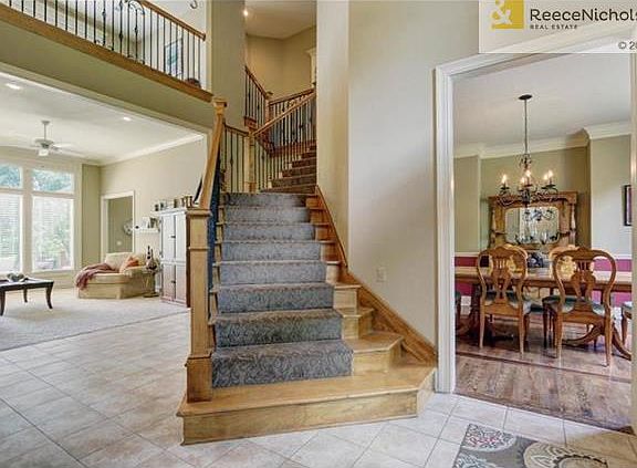 Two story grand entrance welcomes you.