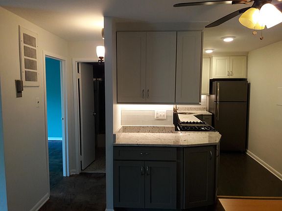 Kitchen and hallway to bathroom