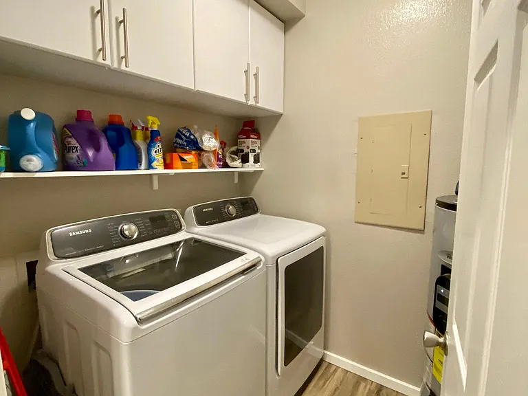 Laundry room, lots of storage, new programmable water heater