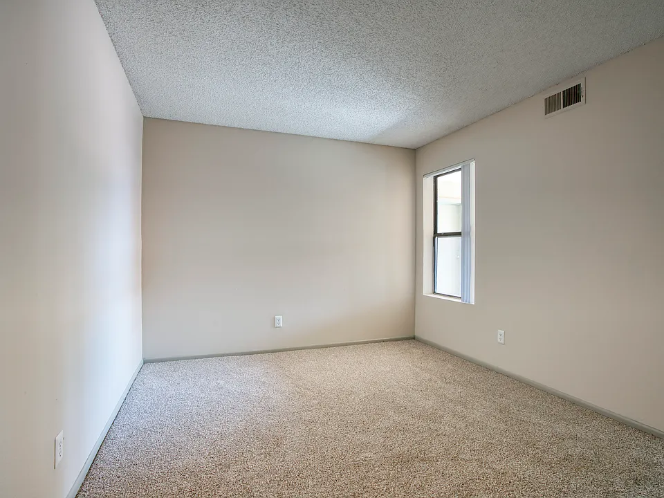 The bedroom includes a large closet and sits next to the full bathroom