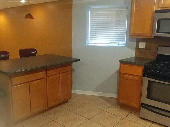 4th image of 5013 W Agatite Ave #1GARDEN