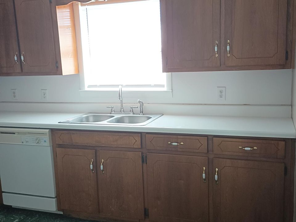 Kitchen with dishwasher new faucet