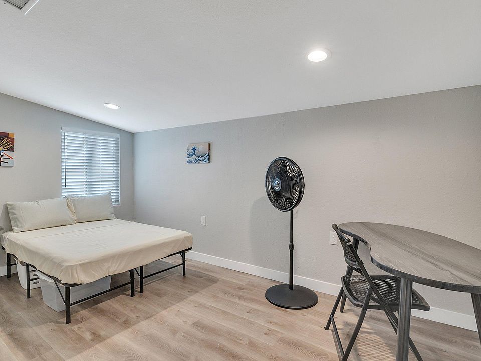Room 8 Marble Desk & Full-sized bed, floor fan