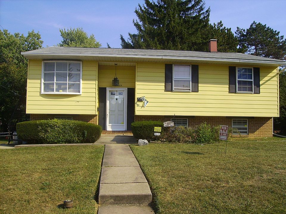 Front view of house and yard