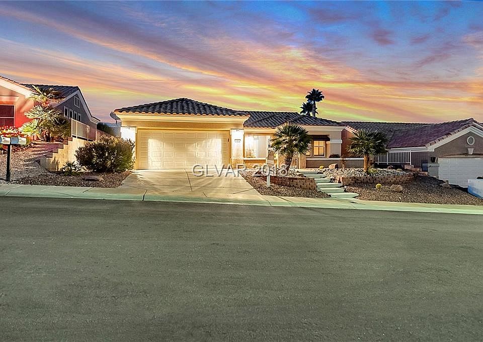 TWILIGHT VIEW OF FRONT OF HOME