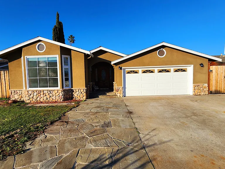 Street View of home. Gate access to backyard on both sides of home with concrete pad capacity to park a boat, trailer or RV up to 28'