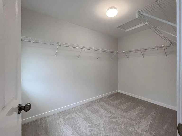 Roomy Walk-in Closet in Master Bedroom