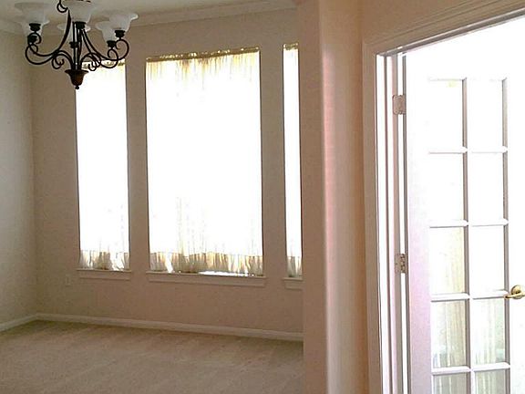 Dining room & Study with french doors that can be used as a 3rd bedroom