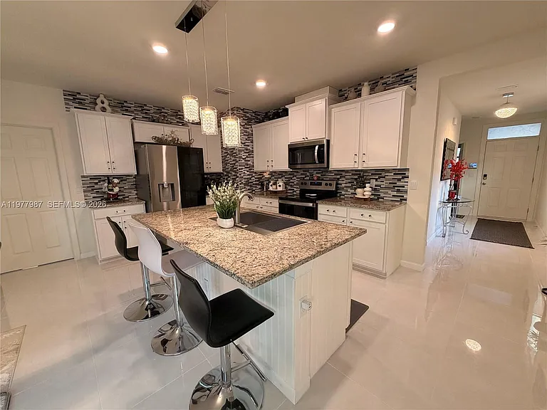 12422 SW Rimini Way — Photo 14