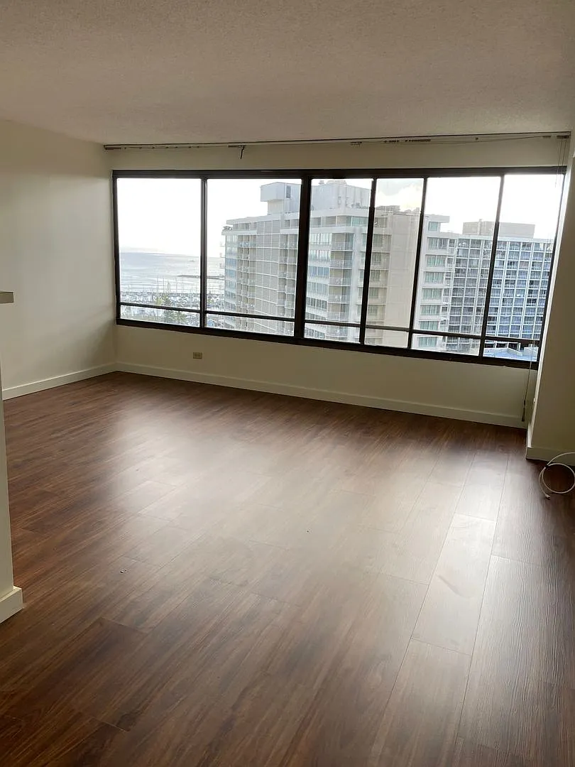 Discovery Bay Unit with Ocean & City Views — Photo 1