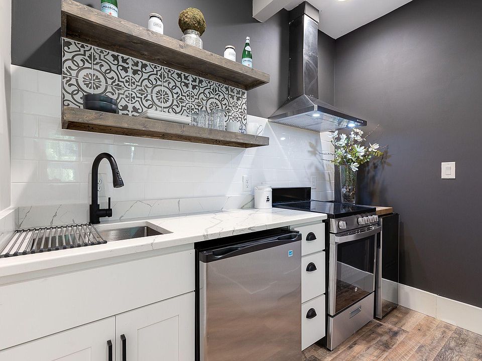 Brand new stainless steel appliances with quartz counter tops