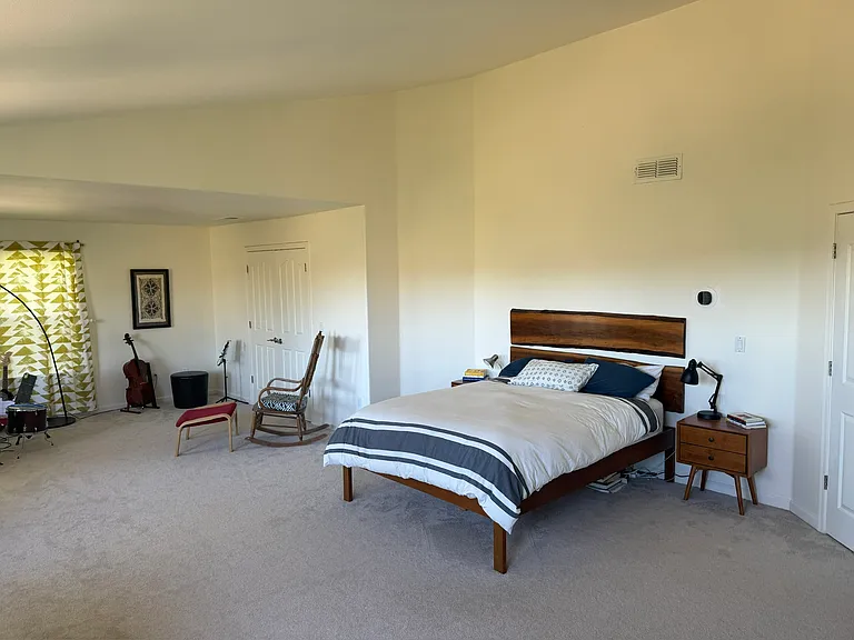 Primary bedroom with view of Helen Putnam.
