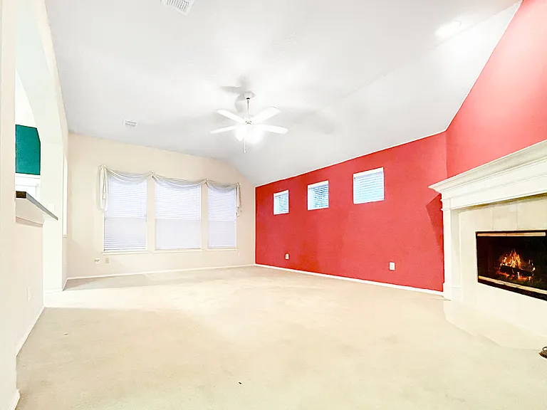 Living Room with Fireplace and Open Concept Kitchen