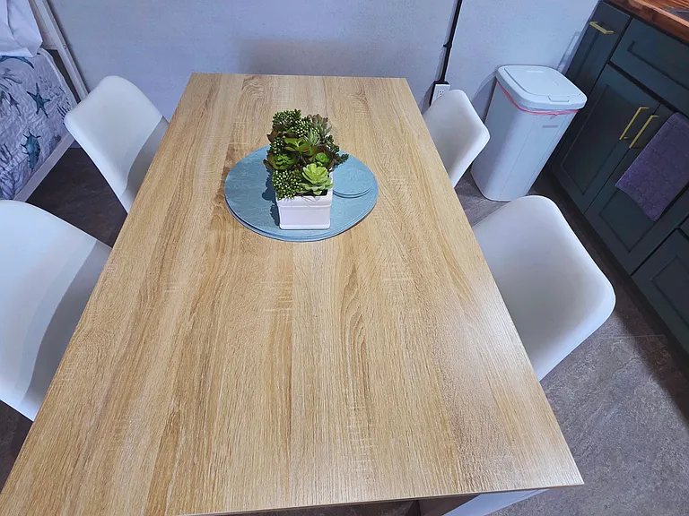 Beautiful 4-person dining area, ideal for family meals and gatherings.