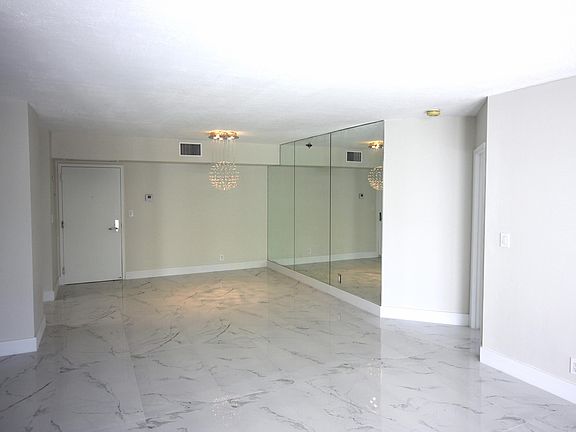 4th image of 3600 Mystic Pointe Dr APT 303