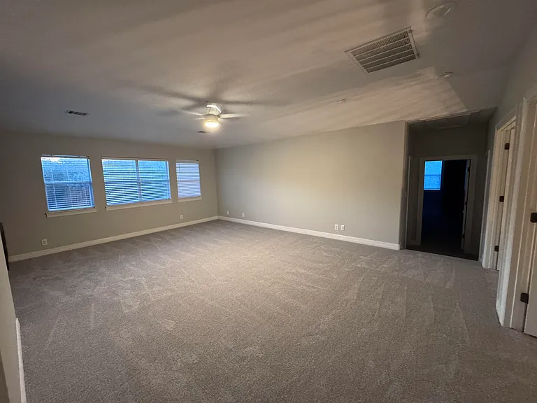 Large loft/game room with built in desk