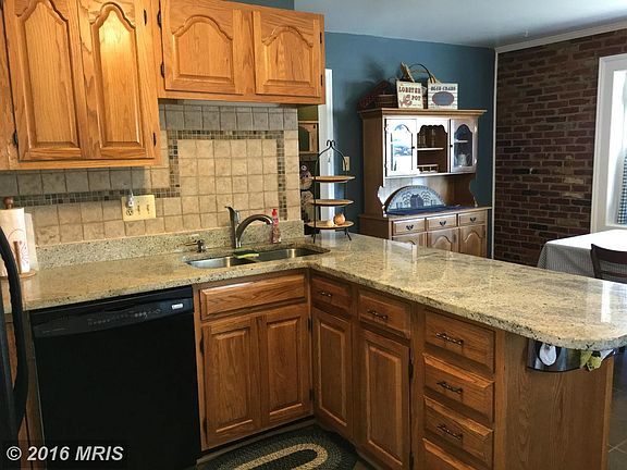 Granite Counters and Tile Backsplash