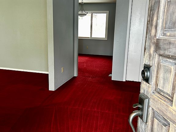 Entrance with coat closet - there''s an additional linen closet in the hallway heading towards the hall bath