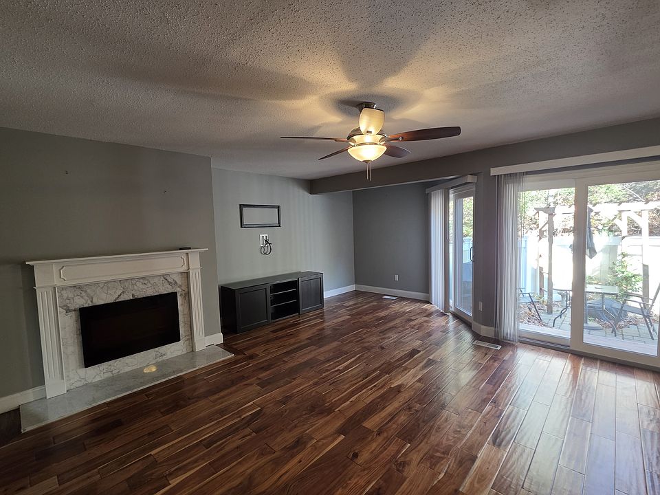 Living room as of 11/25--updated features include TV wall mount with concealed cables