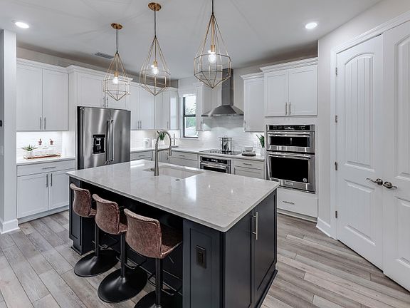 Open kitchen with decorative backsplash