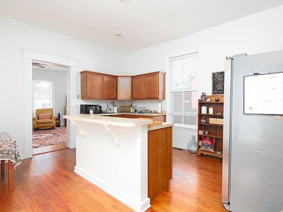 Entrance to unit and kitchen.