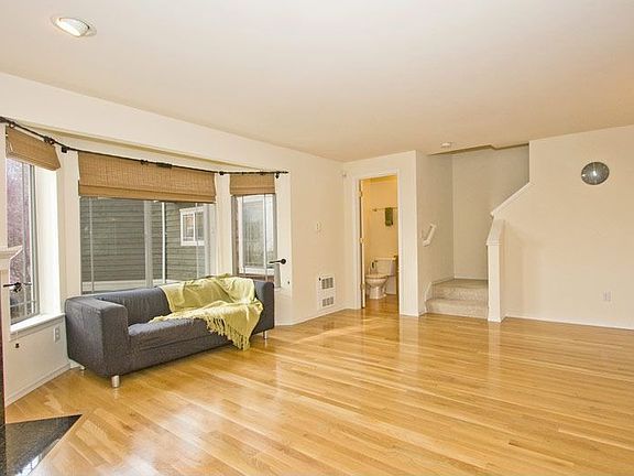 Living room w/hdwd flrs and gas fp
