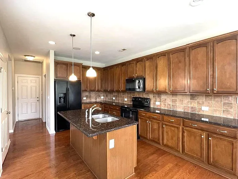10345 Falling Leaf Dr NW — Photo 4