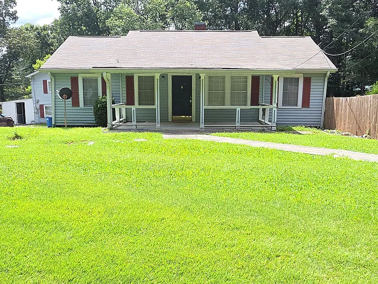 6819 Mark Turner Rd — Photo 1