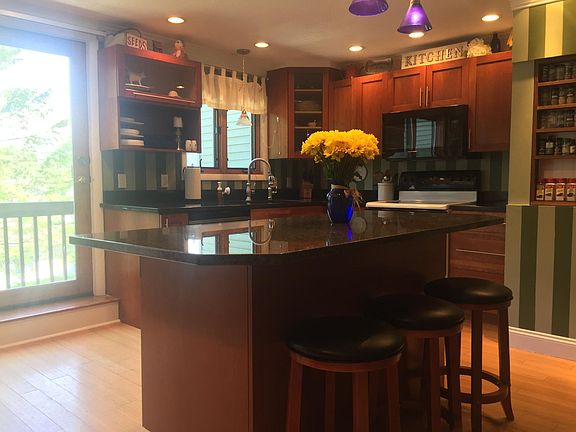 Kitchen with accent granite counter-top island area.