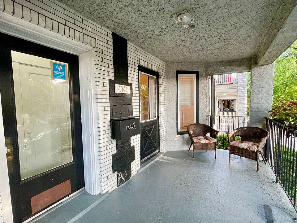Shared front porch, private entrance is door on right