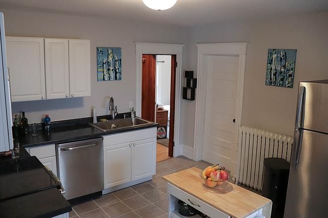 Large kitchen. All stainless appliances. New oven (2026). New microwave (2026). Built-in cabinets.