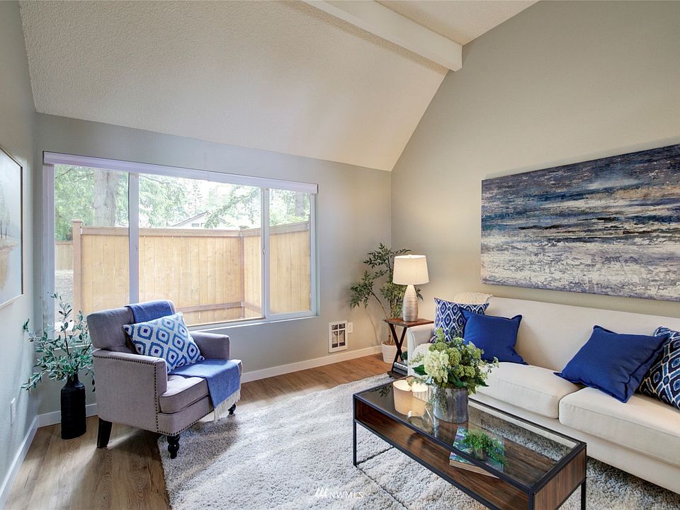 Soaring high ceilings and a large picture window make the great room feel light and bright!