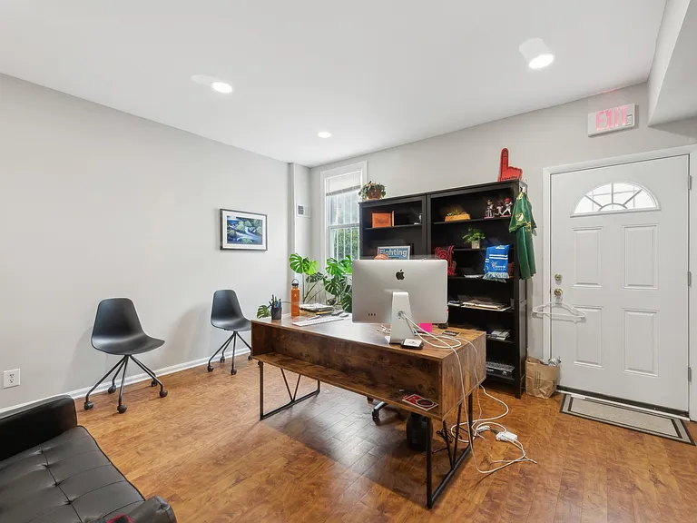 3rd office space on main level w/door to the patio