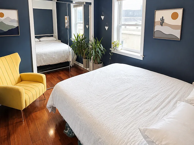 Queen Murphy bed converts the office into a guest bedroom