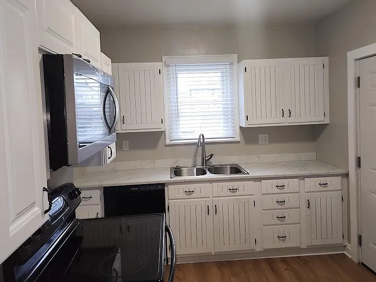 Newly installed remodeled cabinets; new dishwasher, microwave, refrigerator; new luxury vinyl floor; one window with new wide cordless blind