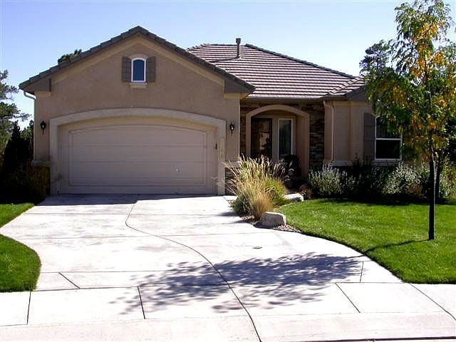 Immaculate Maintence Free Walk-out Rancher in University Park!
