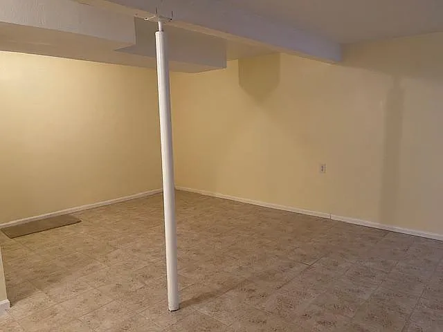 Additional space for storage or large bedroom as this room extend to front with window.