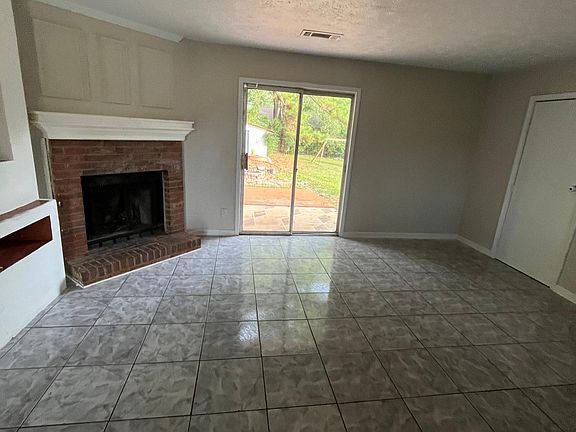 Large guest and family room with fireplace for entertainment and get together