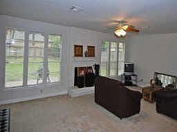 SPACIOUS DEN, COZY FIREPLACE &amp; A WALL OF WINDOWS MAKE IT LIGHT &amp; BRIGHT