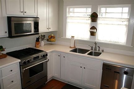 Custom kitchen cabinets with JennAire stainless appliances