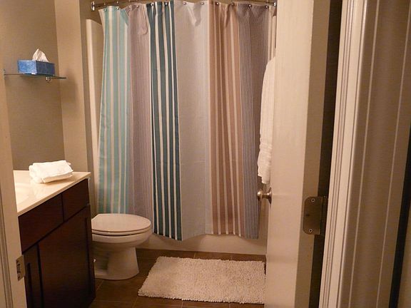 Clean bathroom with fluffy white towels