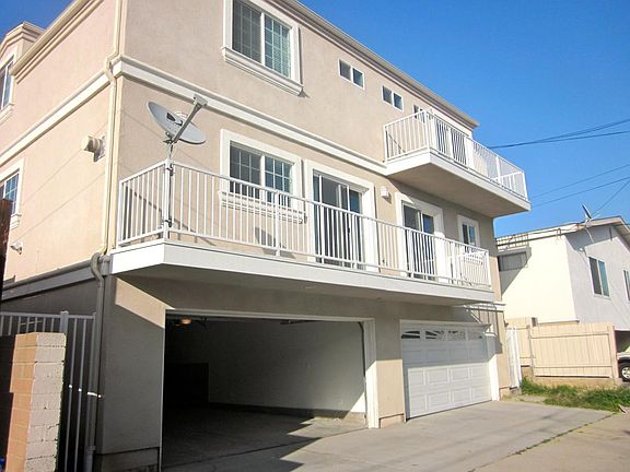 Back exterior of house, 2 car garage